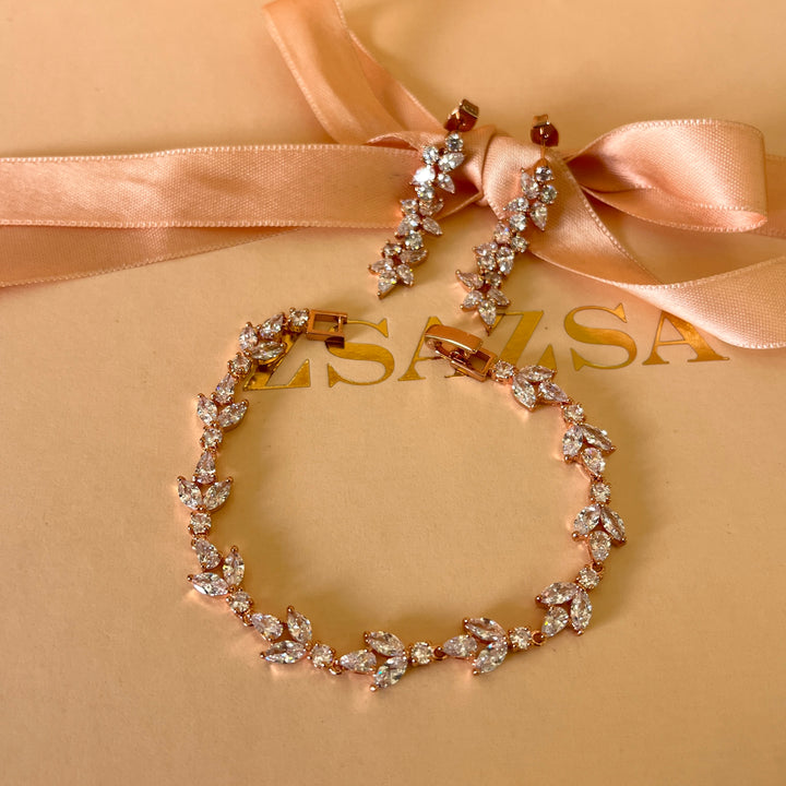 Teardrop and round zircone rose gold plated earrings and bracelet