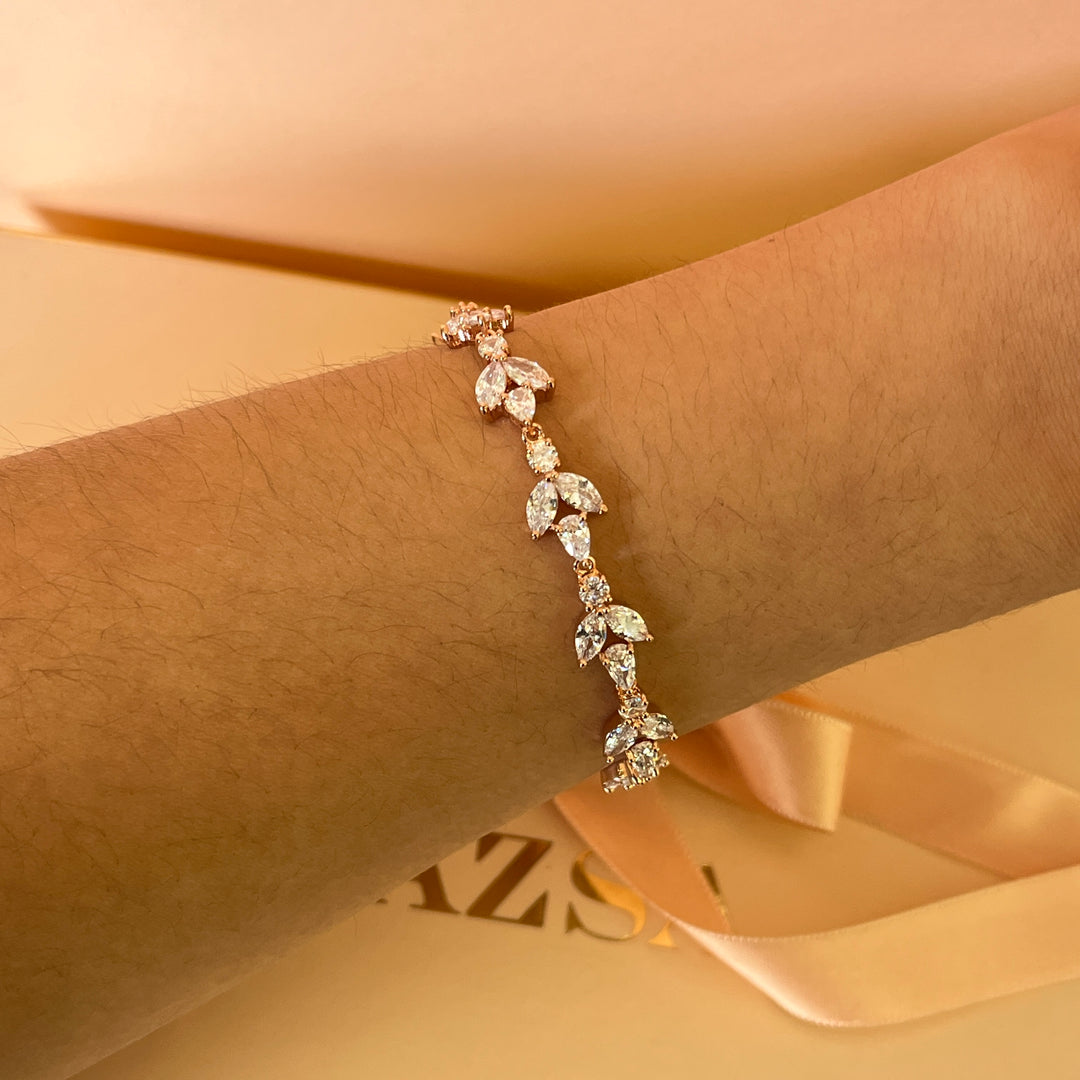 Teardrop and round zircone rose gold plated earrings and bracelet