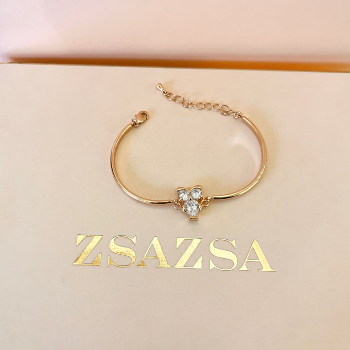 Zircone light rose gold plated owl bangle