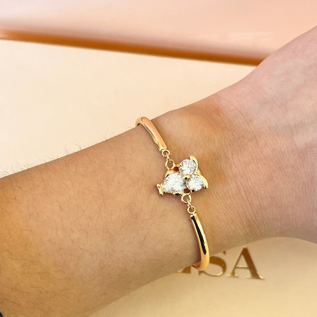 Zircone light rose gold plated owl bangle