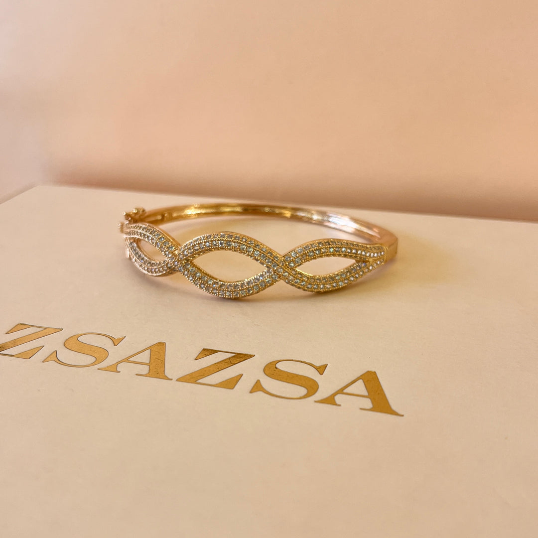 Zircone light rose gold plated twisted bangle