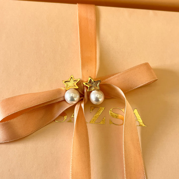 White Mallorca pearls star gold plated studs