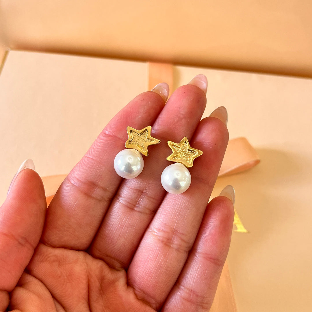 White Mallorca pearls star gold plated studs