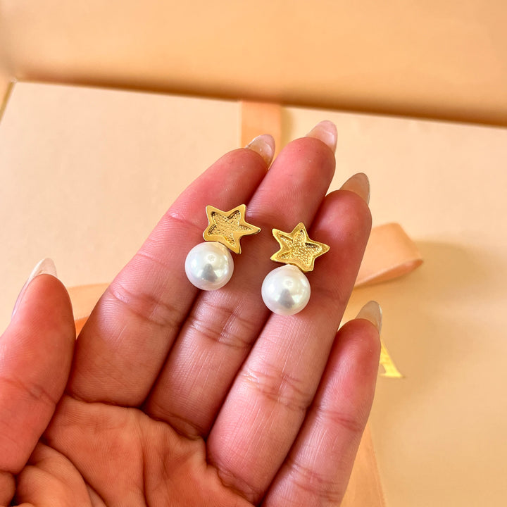 White Mallorca pearls star gold plated studs