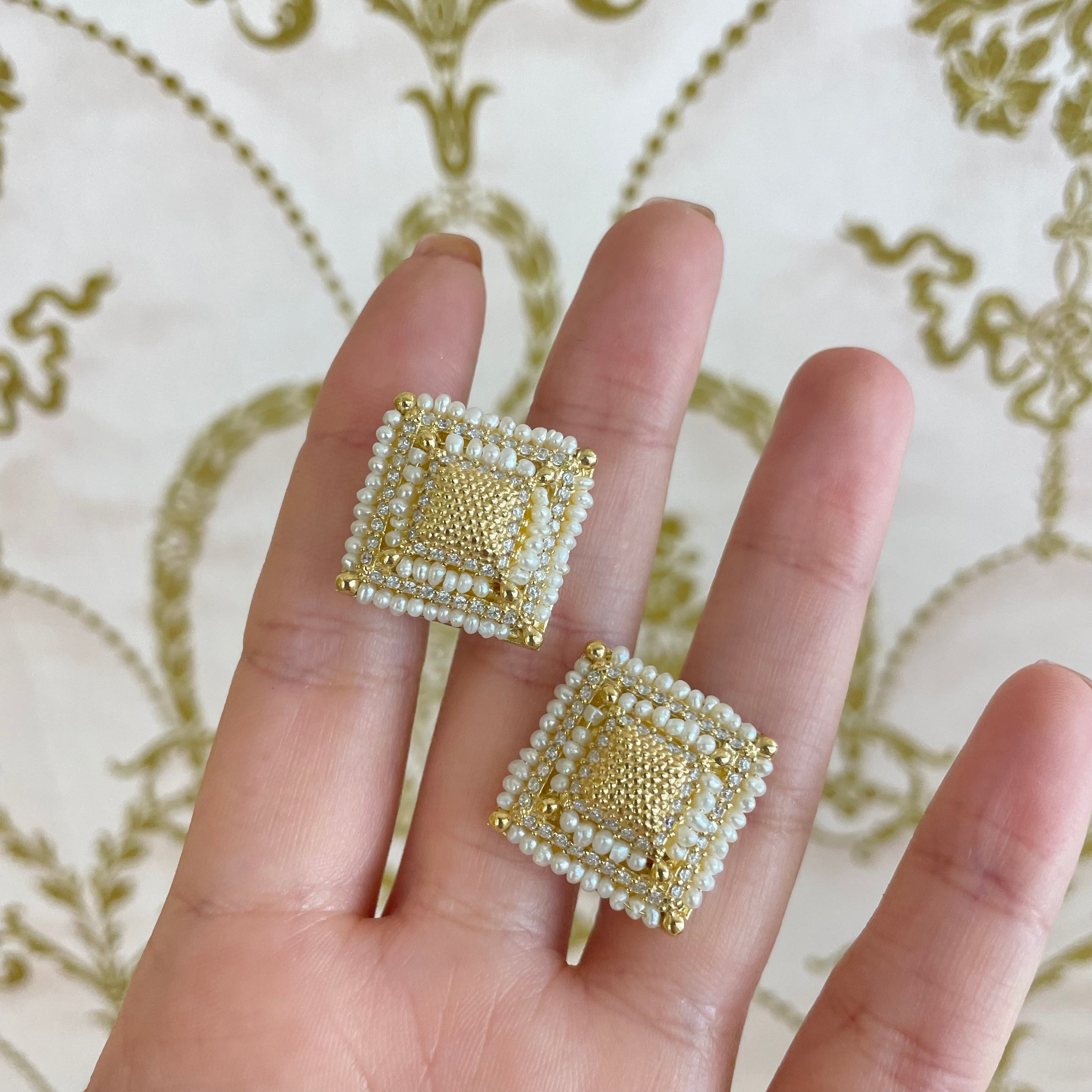 Gold square set with fresh water pearls