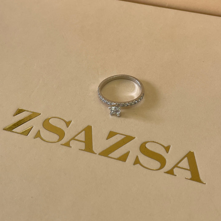 Zircone dainty solitaire with small crystals ring in white gold plating