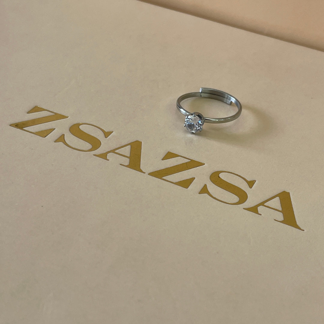 Zircone classic dainty solitaire ring in white gold plating