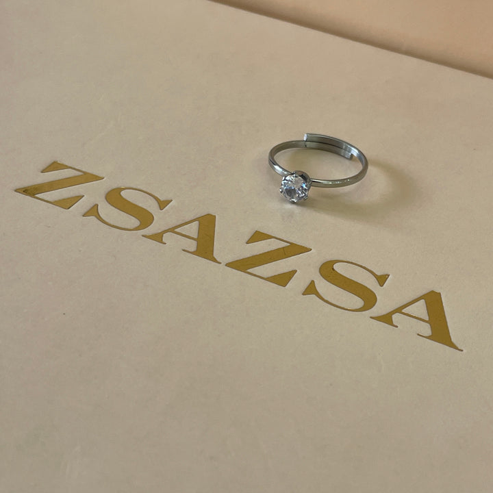 Zircone classic dainty solitaire ring in white gold plating