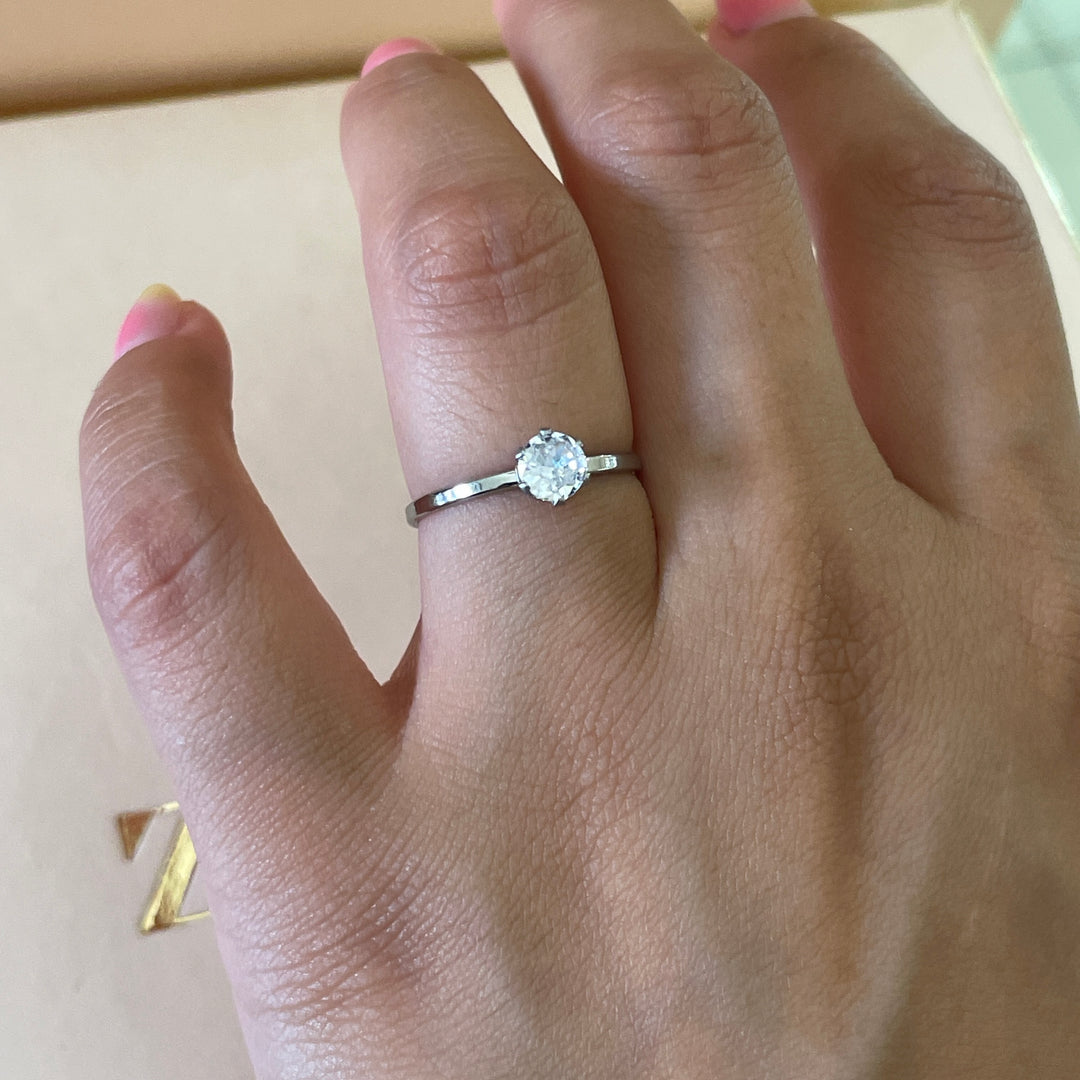 Zircone classic dainty solitaire ring in white gold plating
