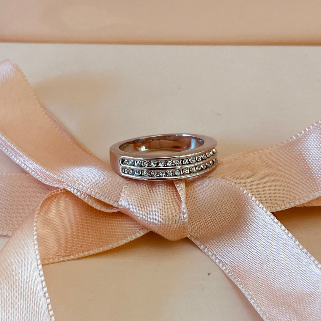 Silver two row with small stones wedding ring in white gold plating