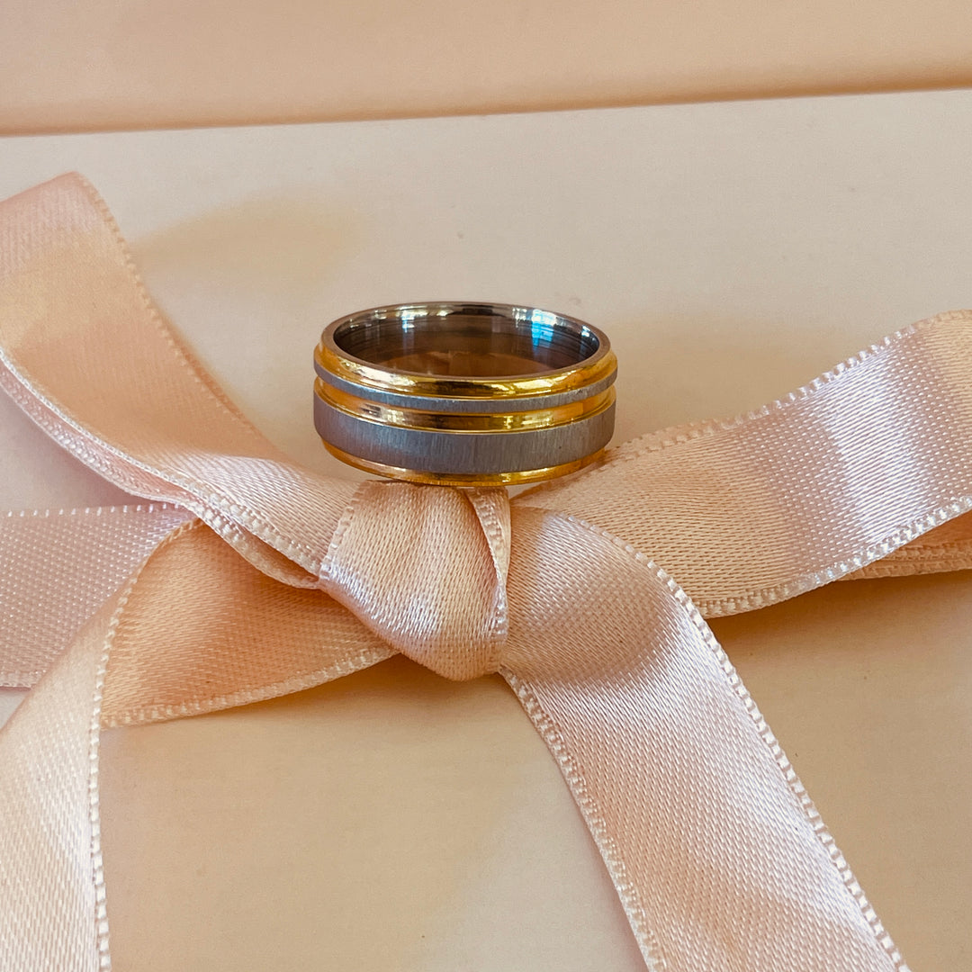 Two tone silver and gold wedding ring in white gold plating