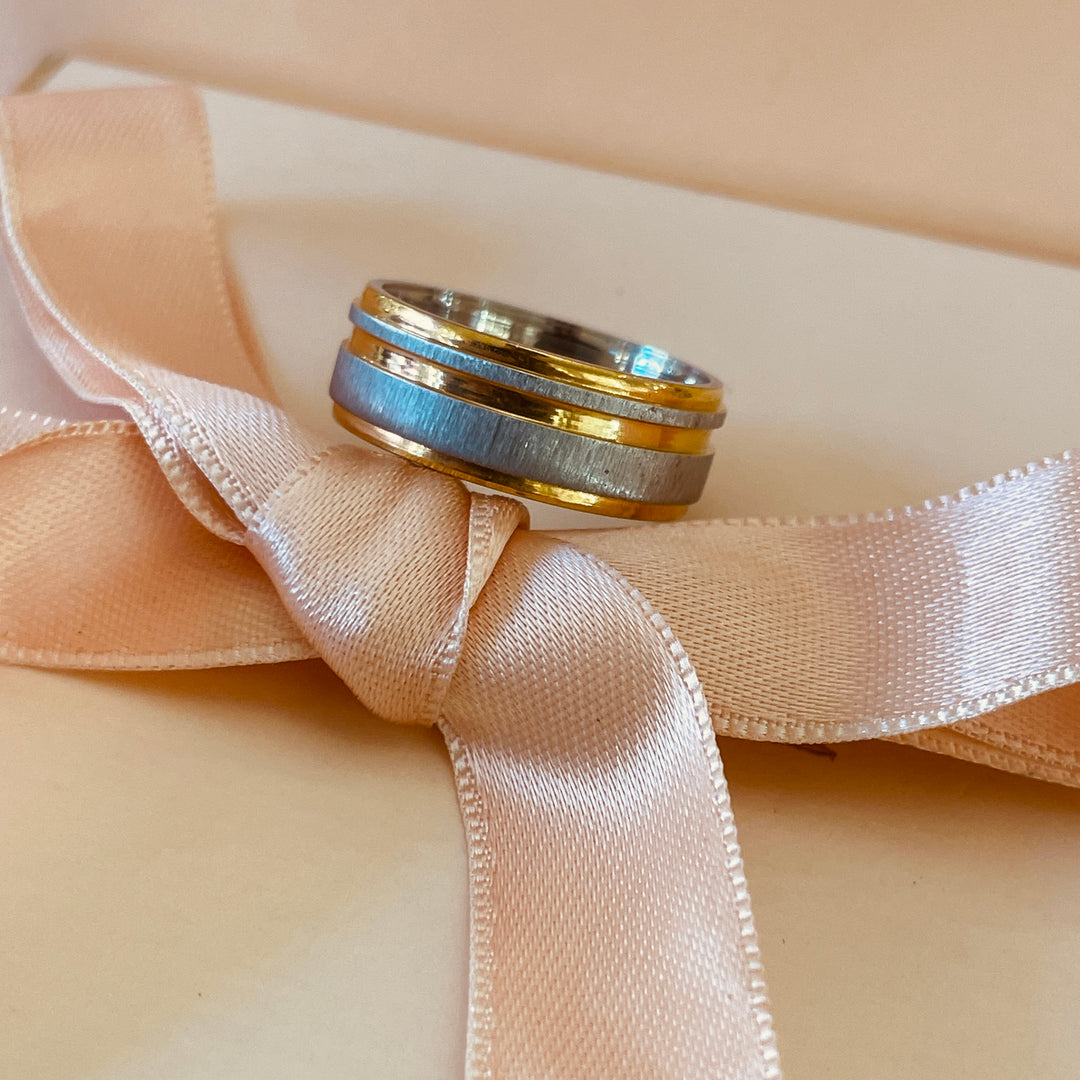 Two tone silver and gold wedding ring in white gold plating