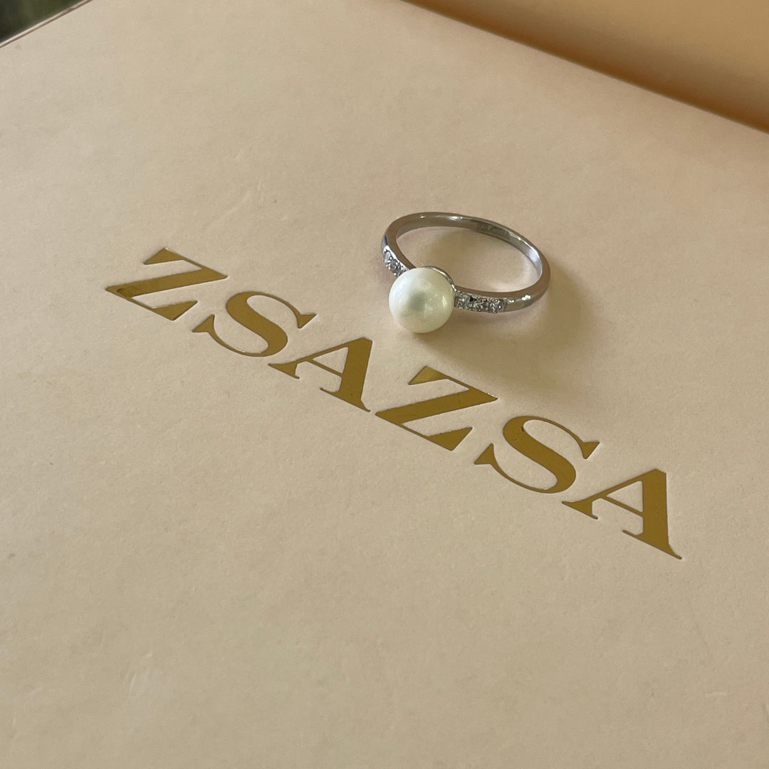 Silver pearl ring with dainty stones in white gold plating
