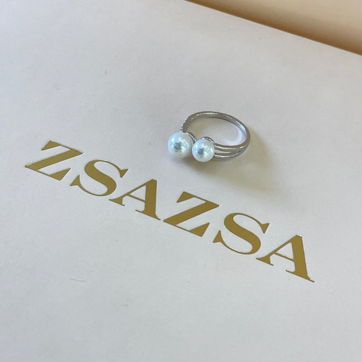 Silver 2 pearl ring with overlapping stones in white gold plating