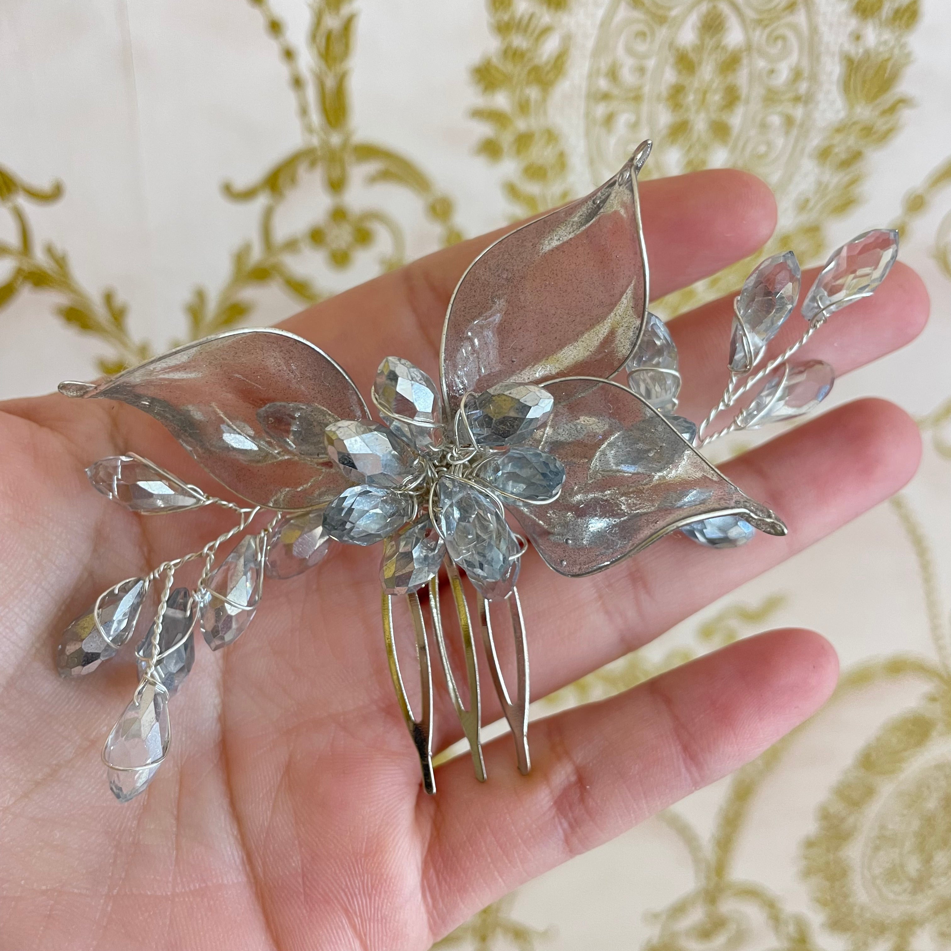 Small silver hair comb