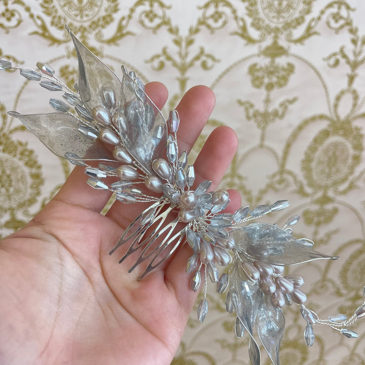 Long silver comb
