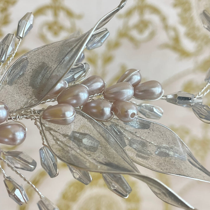 Long silver comb