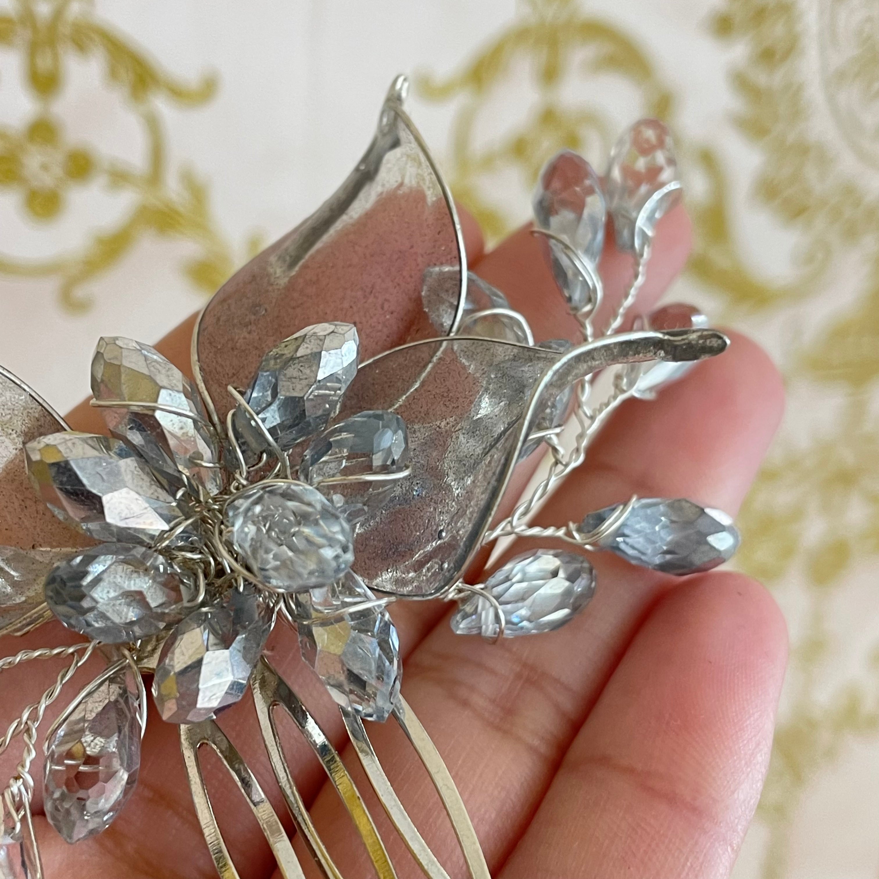 Small silver hair comb